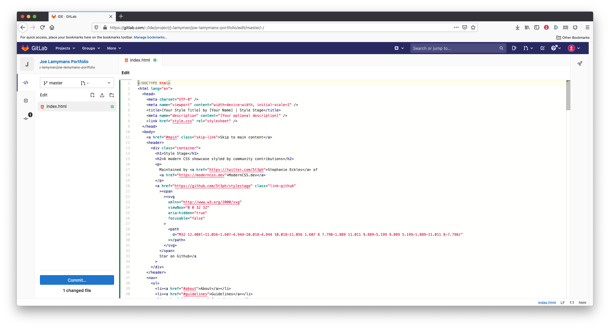 A screenshot of the Gitlab's in browser code editor. The screen features a menu down the left which shows the files that the user has added. I have added an index.html file which is visible. The majority of the screen is taken up by HTML5 code that I have copied and pasted in. Scanning this code, the user can see a <head> element containing references to a website called Style Stage. At the bottom of the screenshot is a button labelled 'Commit...' and some text letting the user know that 1 file has changed.